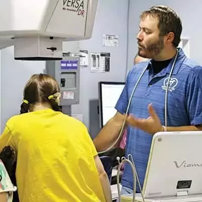 veterinarian doing ultrasound